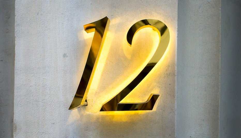 a large house number sign that can be easily read by emergency responders a large house number sign that can be easily read by emergency responders