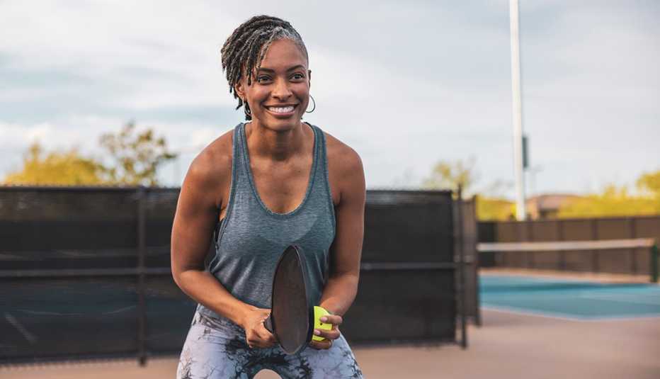 Strong woman playing pickleball