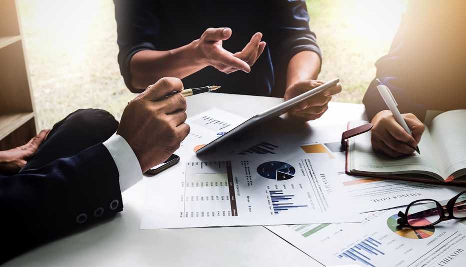 Financial planners sitting at a table
