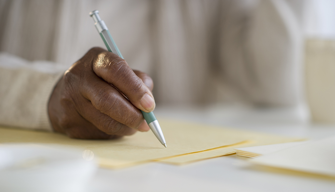 Mature hand writing letter
