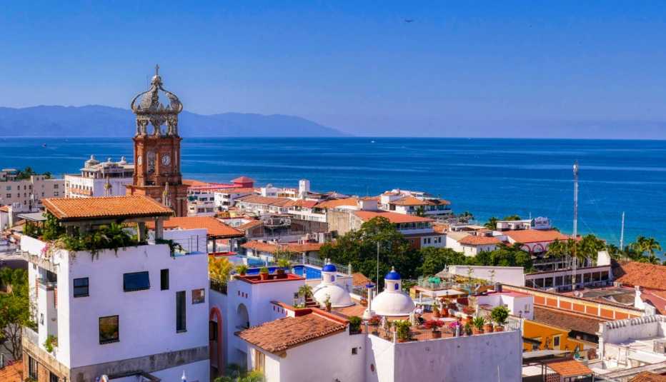 view of the ocean over houses in puerto vallarta mexico