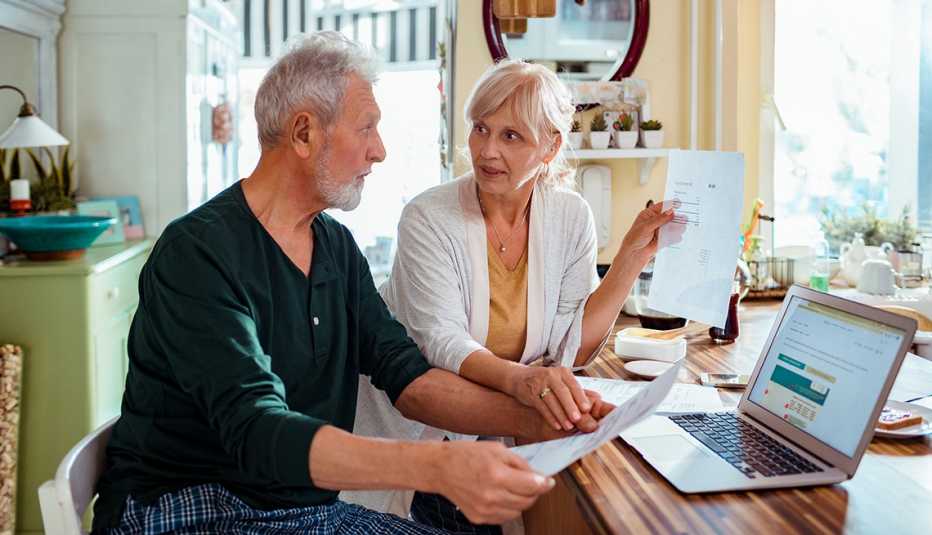Couple at a computer doing home finances