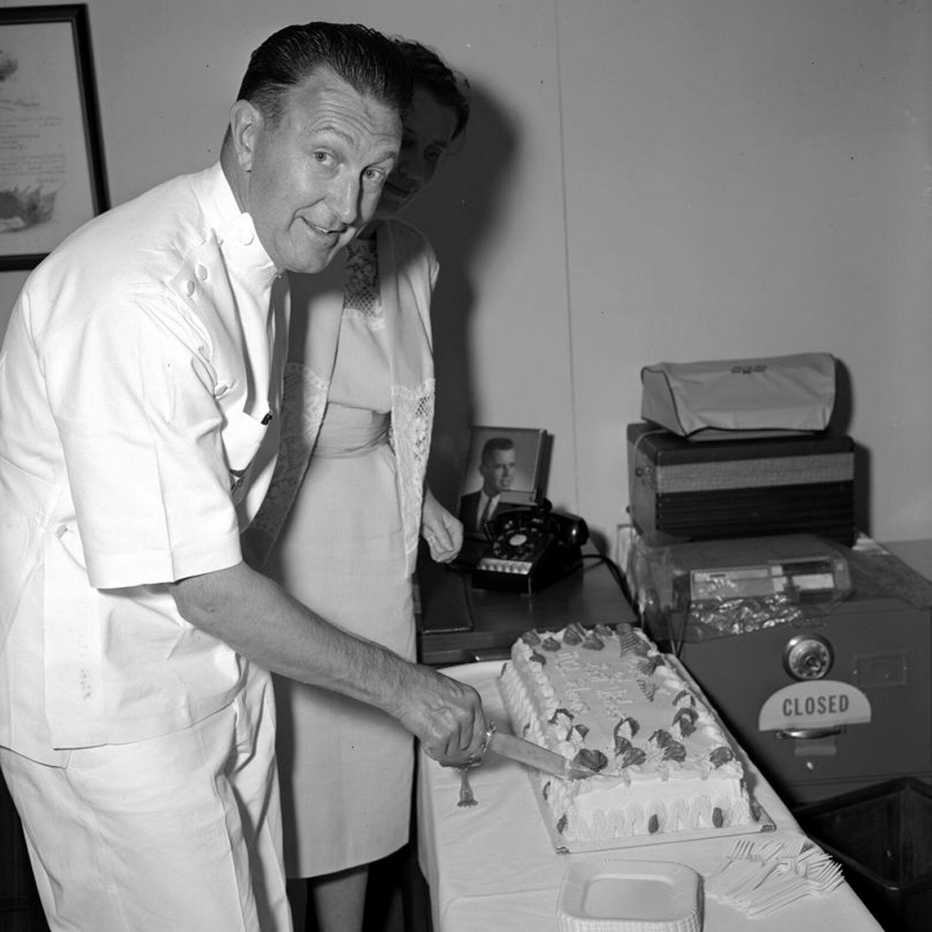 1962 Retirement party for Lieutenant Colonel Philip Sidmore from the office of President John F. Kennedy’s Physician.
vintage photo of a retirement party in nineteen sixty two for lieutenant colonel philip sidmore from the office of president kennedys physician