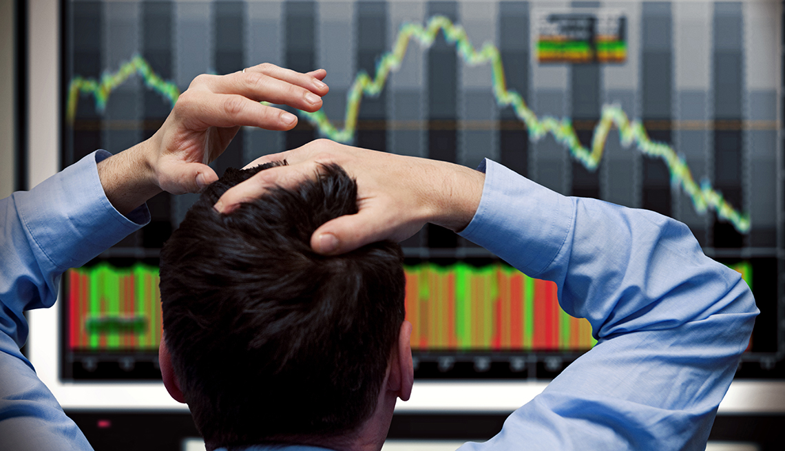 Man watching the stock market fail
