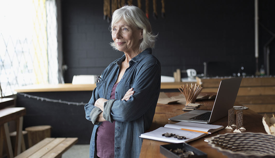 Woman standing at her desk