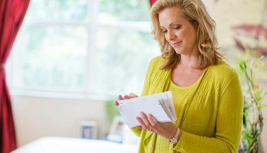 A woman checking her mail