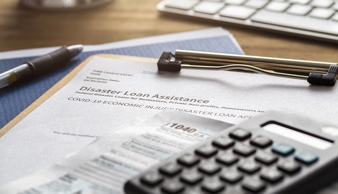 SBA - Small business administration economic injury disaster loan and emergency advance submitted application and tax forms from small business owner applying for relief due to the coronavirus