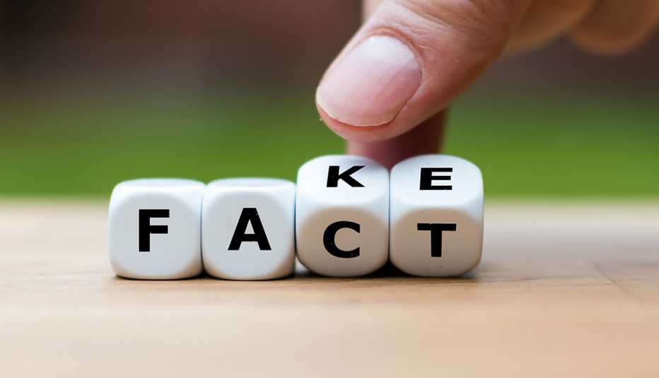 Fact vs Fake information concept with dice Fact vs Fake information concept with dice