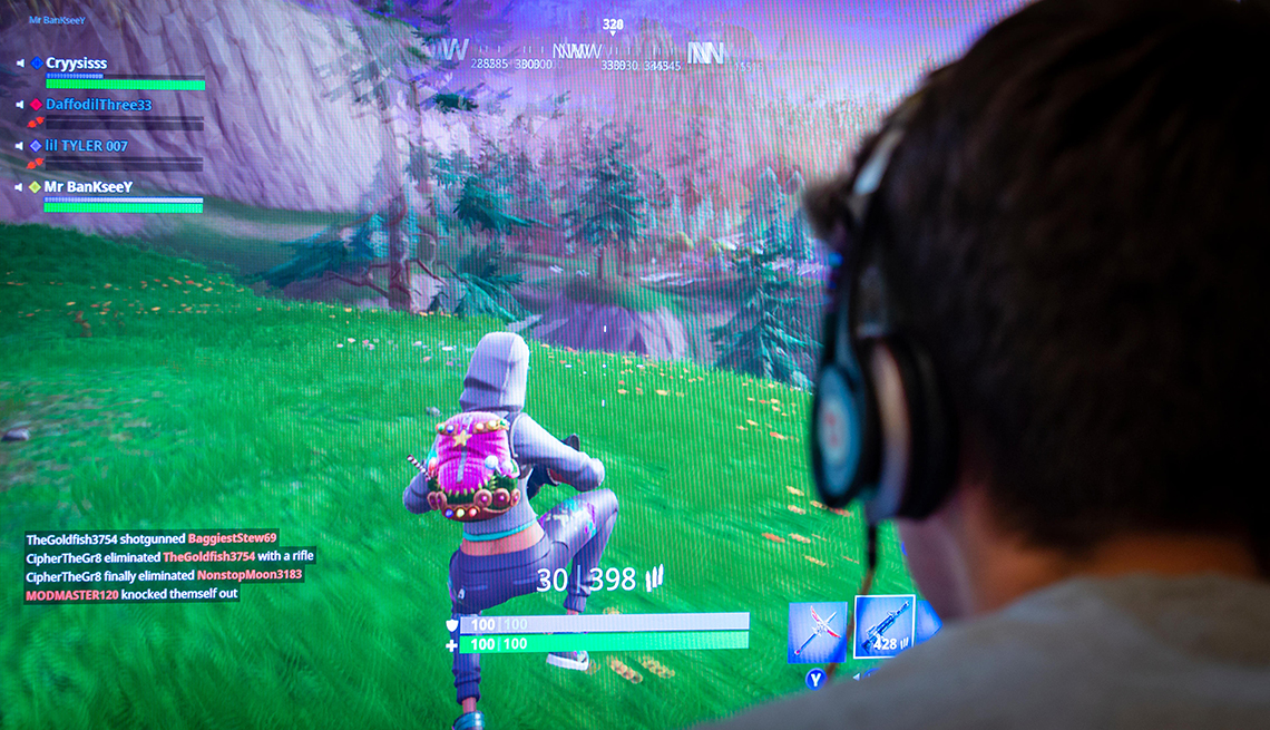 Person playing Fortnite video game
