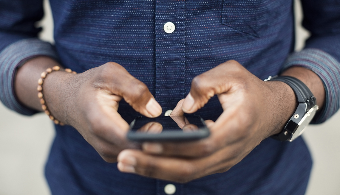 Man hands holding smartphone