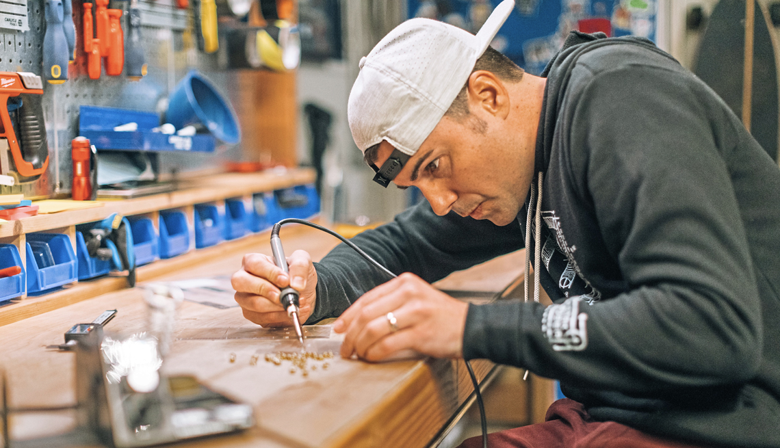 former nasa engineer mark rober working in his california lab