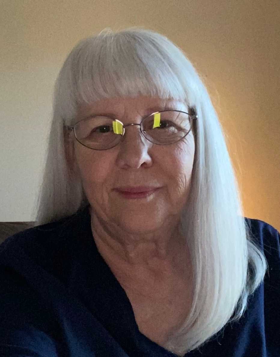 a headshot of sandy barber