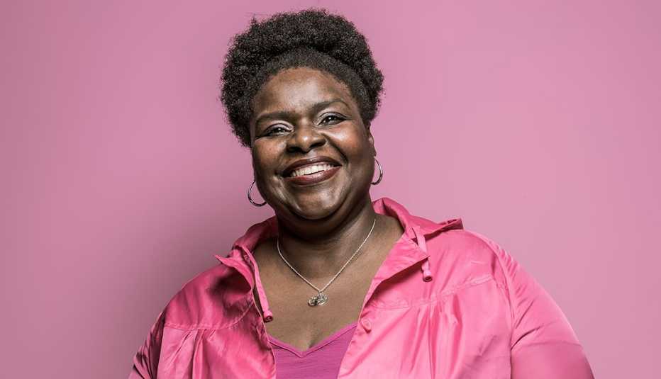 a woman on a pink background