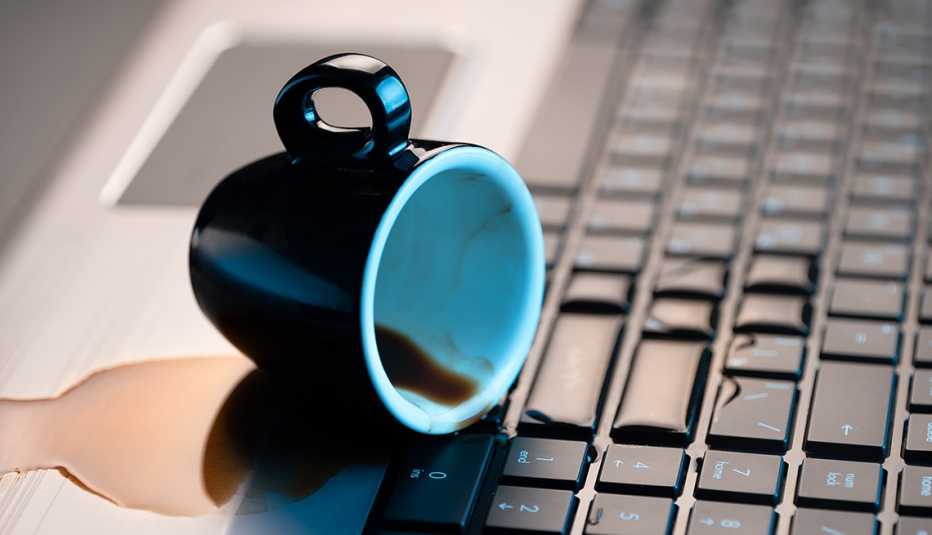 Spilled coffee or tea on a laptop. 