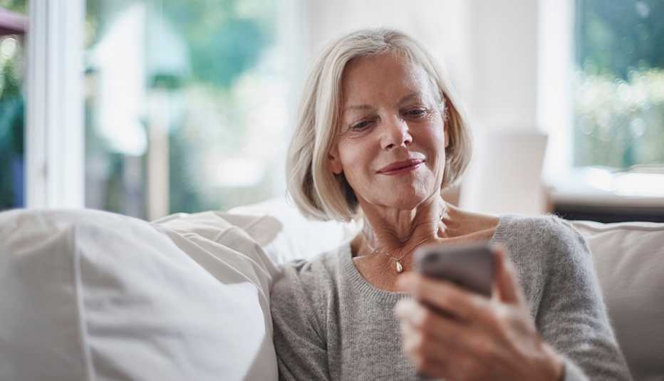 Woman staring at smartphone