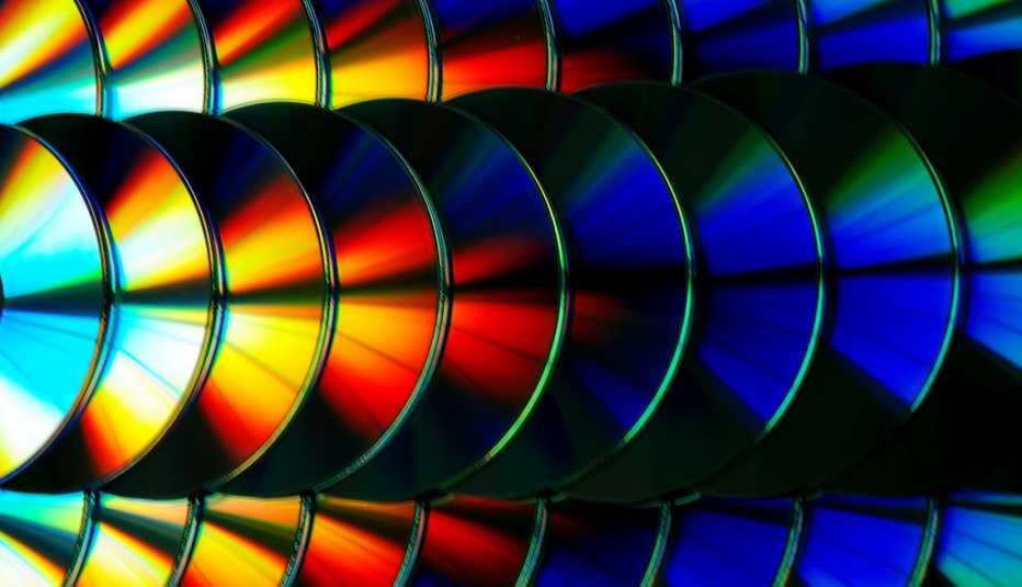 colorful cds arranged in rows colorful cds arranged in rows