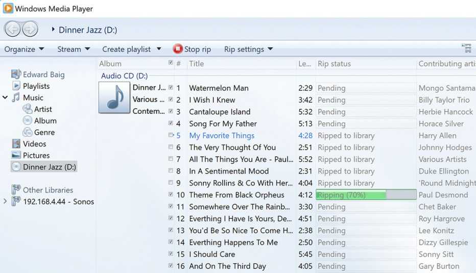 a screenshot of windows media player while c d ripping is in progress