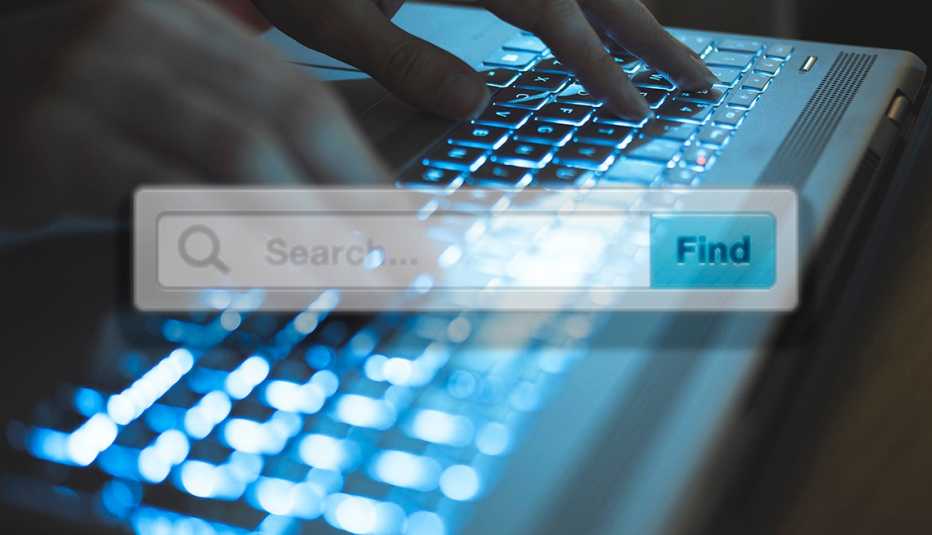 a search bar superimposed over hands on a keyboard
