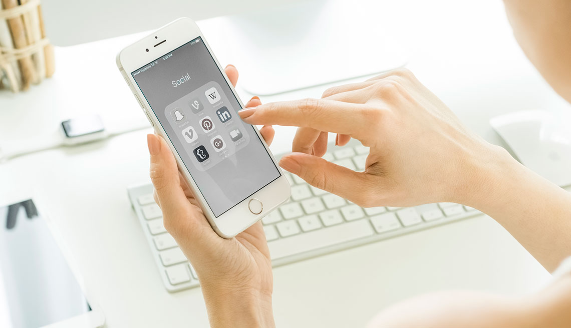 woman using a phone with gray screen