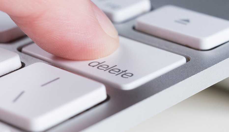 Person deleting files from computer