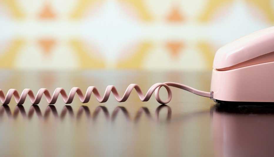 a close up of a cord from an older landline phone