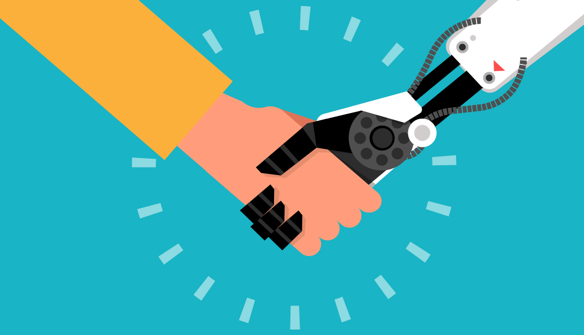 a human hand and a robot hand holding hands