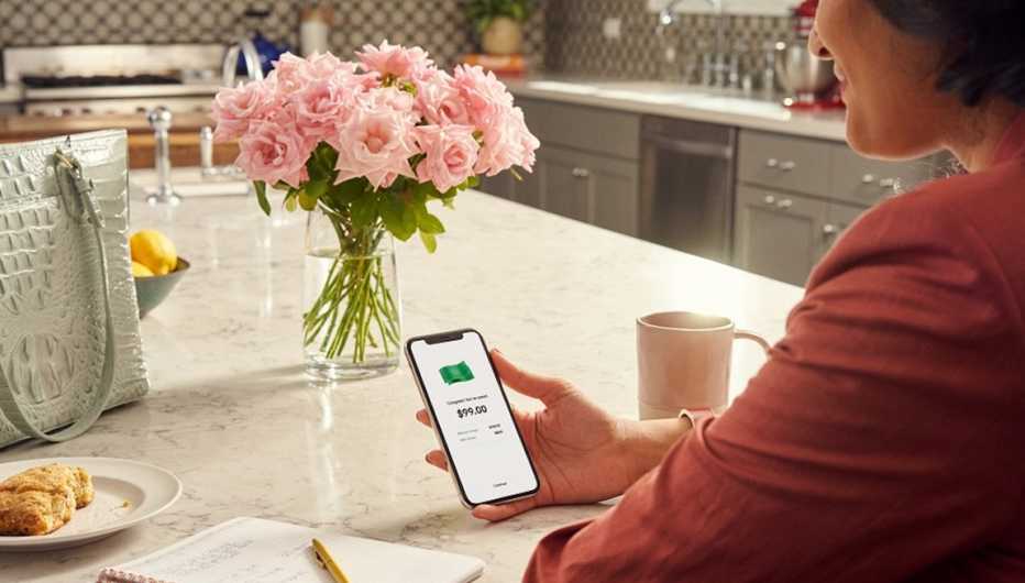 Women using Honey app on smartphone