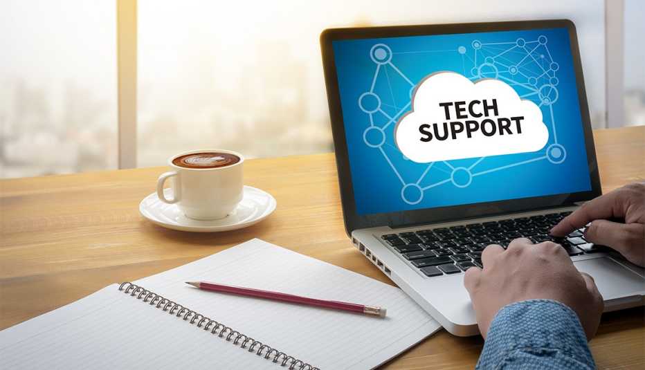 man using laptop for online tech support
