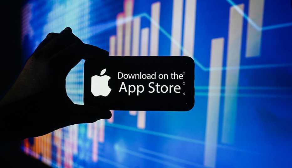 a smartphone displaying an apple logo and download on the app store against blue field