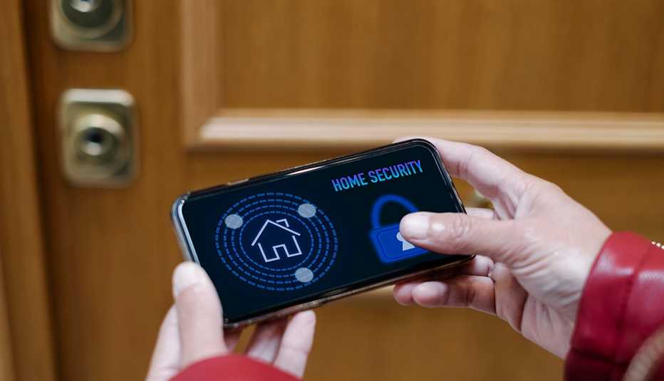 a smartphone with a lock and a house display