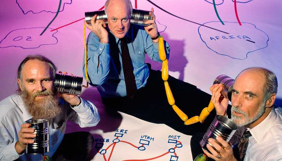 Internet pioneers Jon Postel, Steve Crocker and Vint Cerf use zucchini, coffee cans and drawings to represent the primitive Net they helped to create.