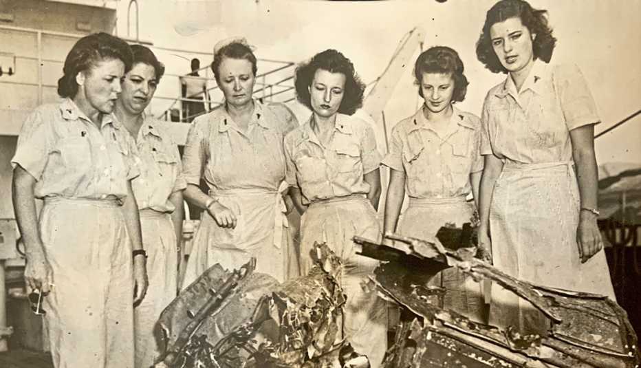 old sepia toned world war two photo of a group of six american nurses on board a navy ship