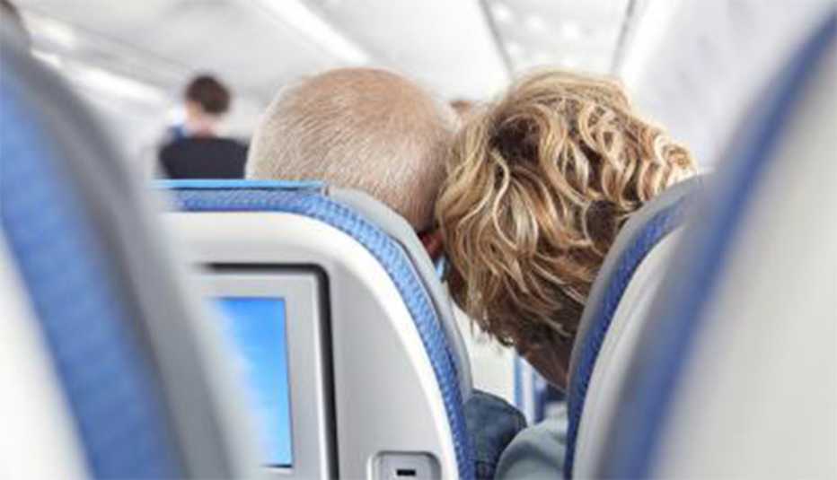 1140-couple-in-airplane-large