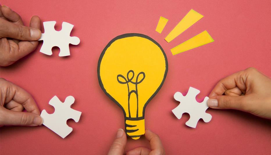 image of 4 hands holding puzzle pieces and an image of a yellow light bulb