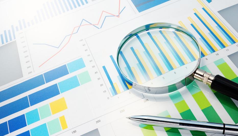 Analyzing data, charts, magnifying glass, AARP Research, General Use
