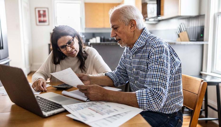 Older couple paying bills