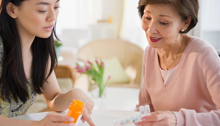 Daughter explaining medication to Mother, Caregiving, Rewards for Good Sweepstakes, Earn Points