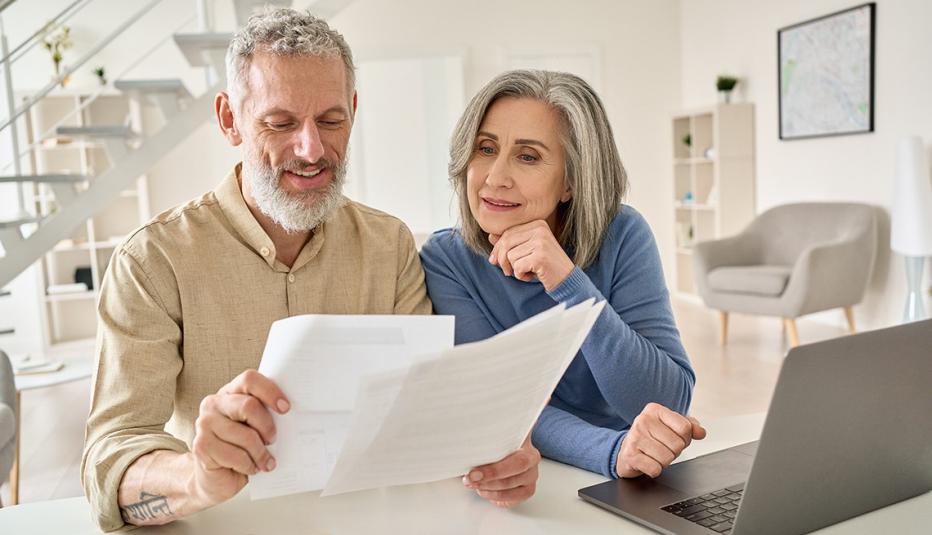 Older couple reviewing retirement documents