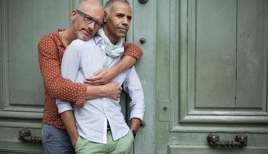 Same sex couple hugging