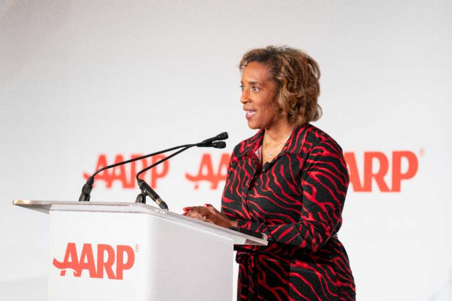 woman speaking at lectern 