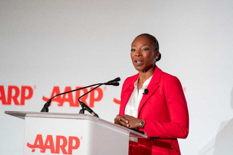 Myechia Minter-Jordan speaking at lectern