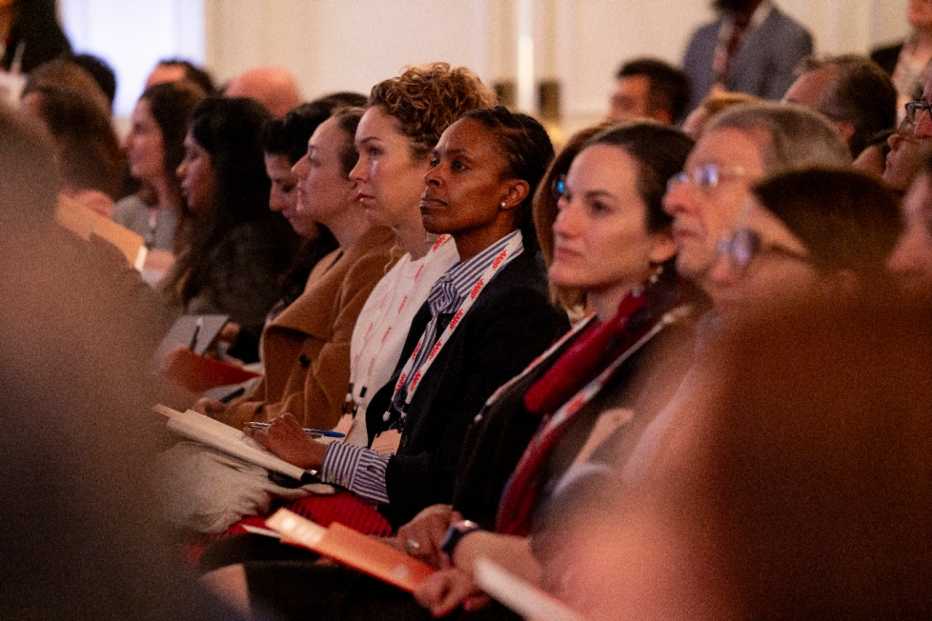 view of audience listening at conference