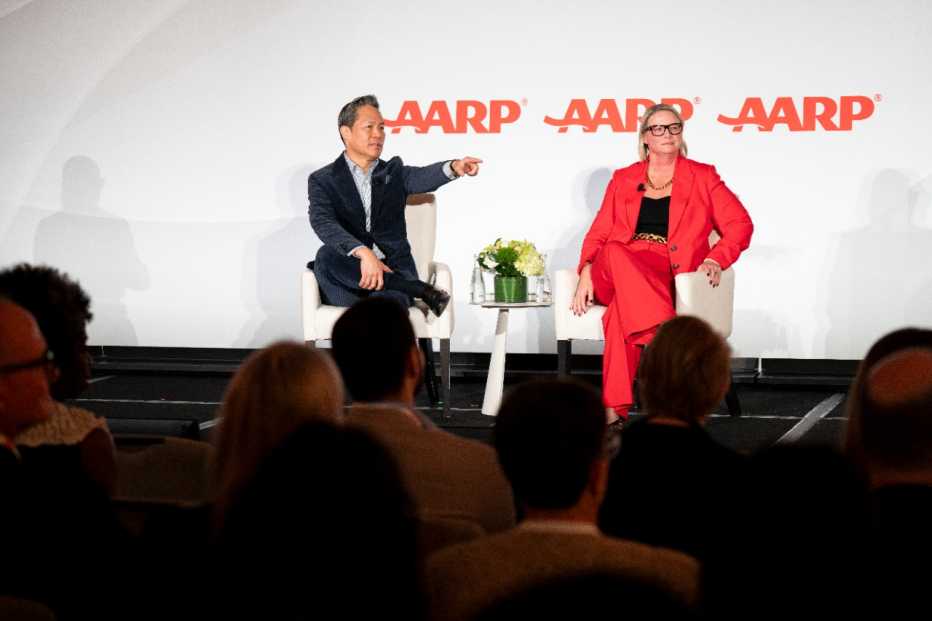 Deb Whitman and another presenter in front of conference audience