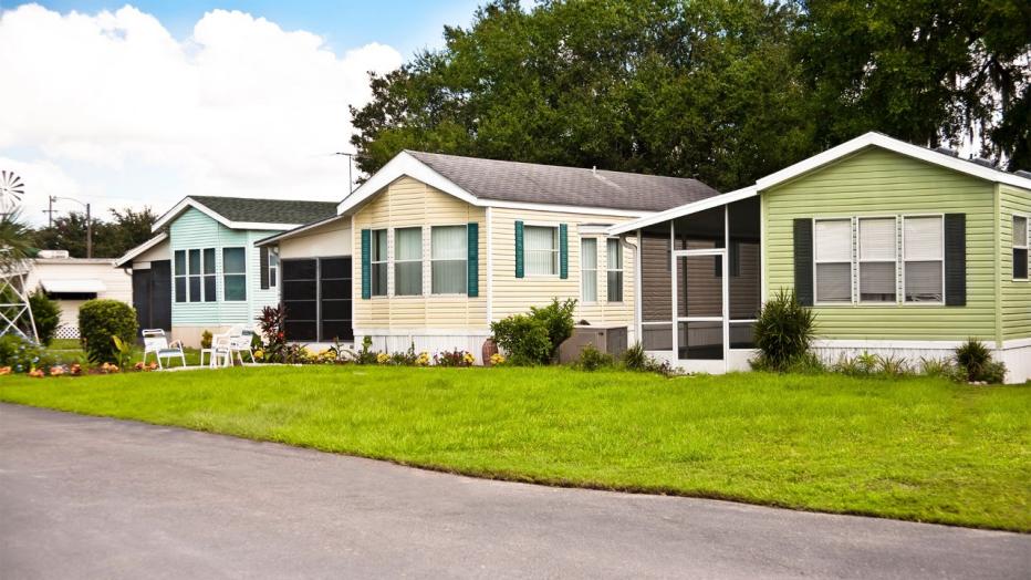 image of 3 houses on quiet street