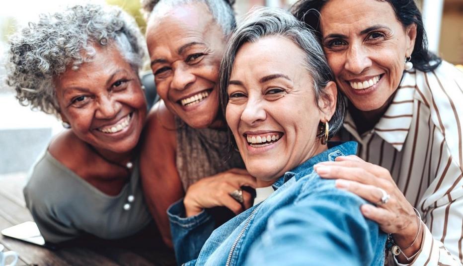 Four smiling women