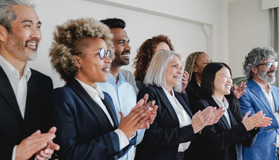 Business event attendees clapping