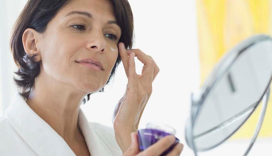 Older Woman Putting on Makeup