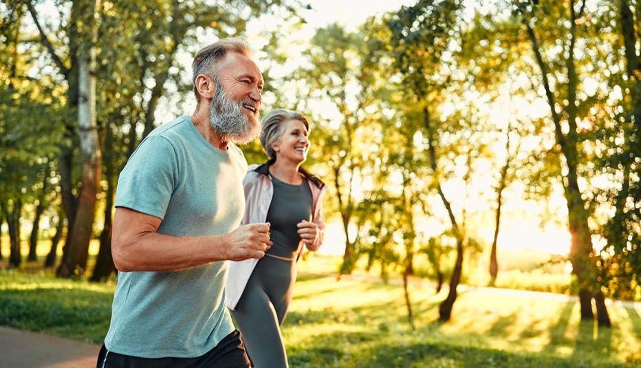 Older couple jogging outdoors