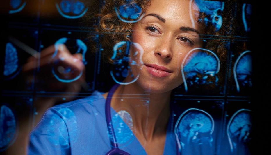 Doctor reviewing brain scans