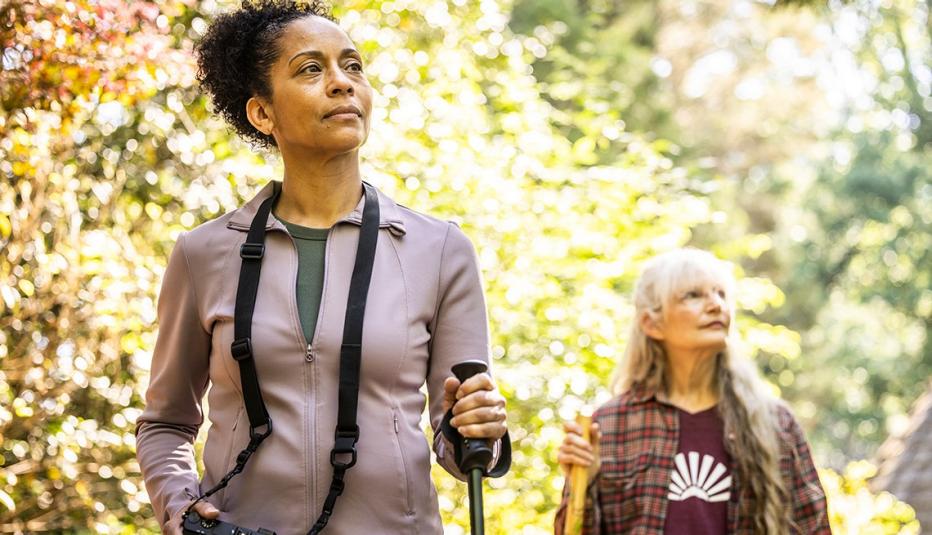Women in Menopause Often Go Untreated Senior women hiking in forest